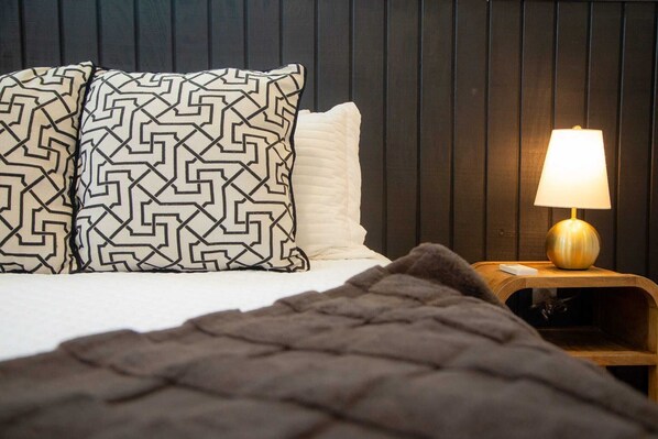 1 bedroom, desk, iron/ironing board, travel crib