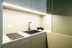 Fridge, microwave, stovetop, coffee/tea maker