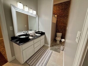 Hair dryer, towels, soap, shampoo