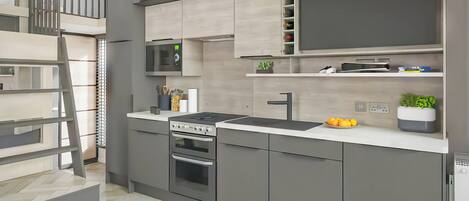 Frigorífico, horno, placa de cocina y tostadora