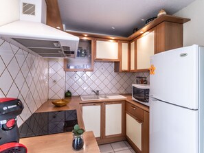 Fridge, microwave, cookware/dishes/utensils