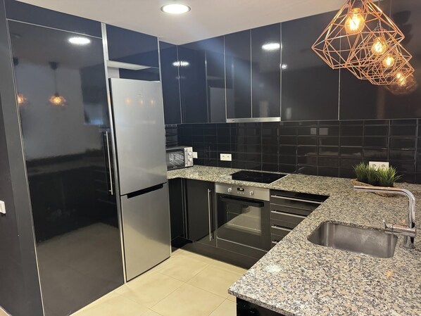 Fridge, microwave, oven, coffee/tea maker