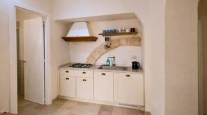 Fridge, cookware/dishes/utensils, dining tables