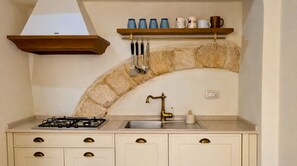 Fridge, cookware/dishes/utensils, dining tables