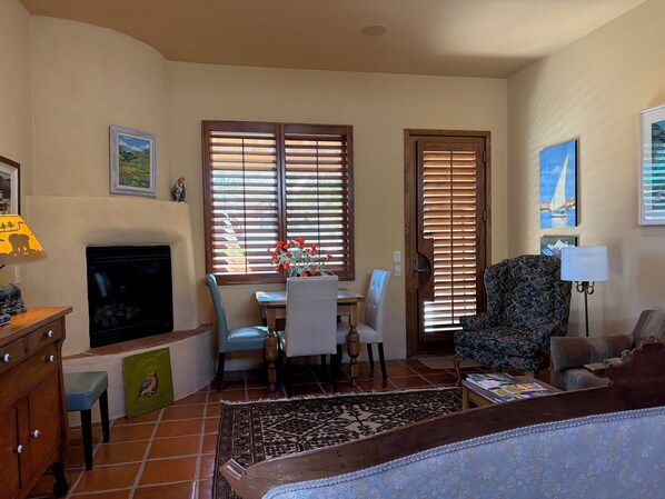 TV, fireplace, books, video library