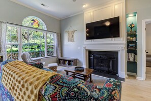 Smart TV, fireplace, books