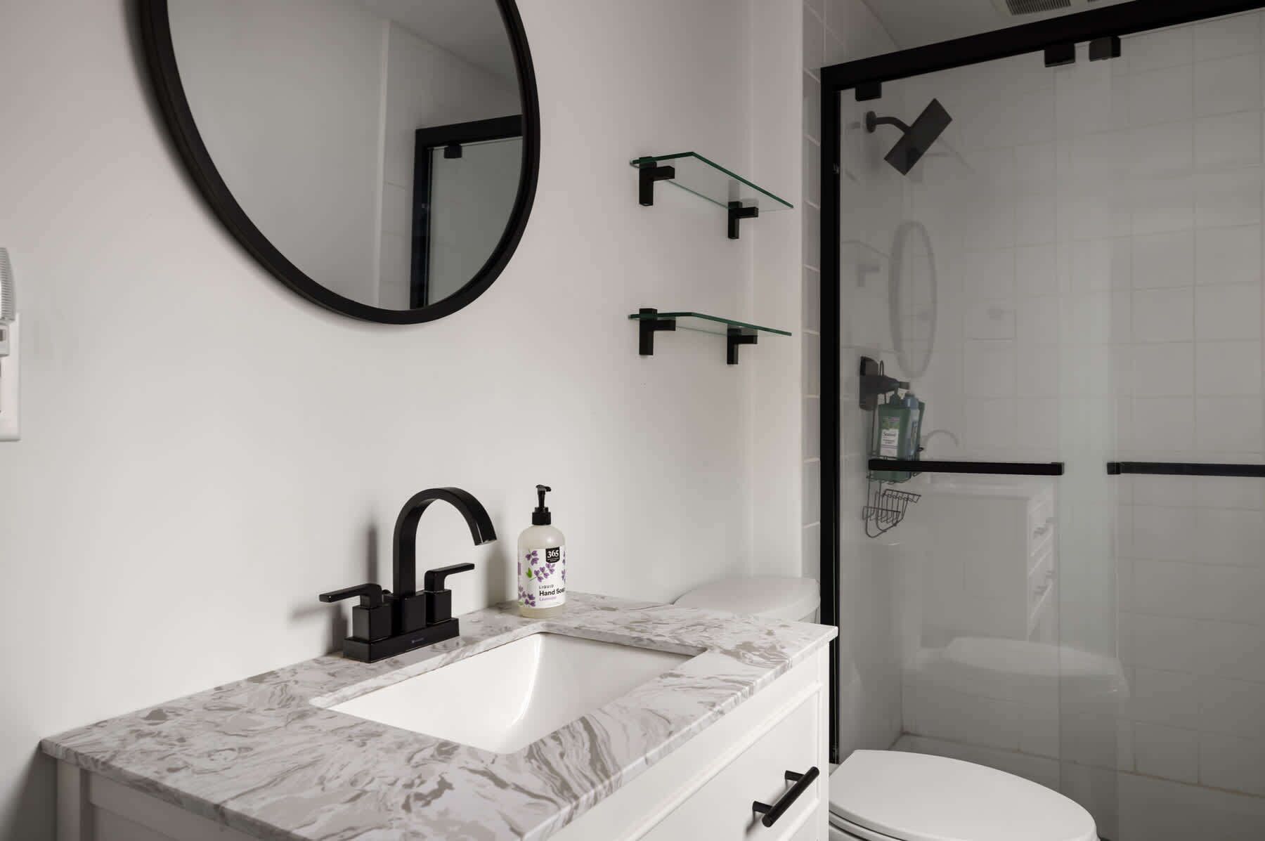 Shower, hair dryer, towels, shampoo