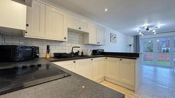 Apartment | Private kitchen | Fridge, microwave, oven, stovetop