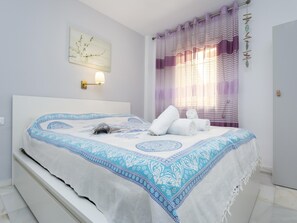 2 dormitorios, tabla de planchar con plancha, Internet y ropa de cama