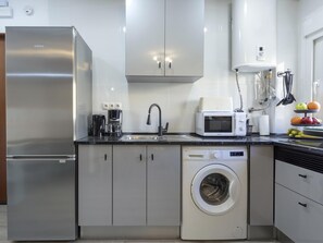 Fridge, microwave, coffee/tea maker, toaster