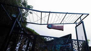 A metal gate with a sign reading "Noah Crest." - Noah Crest (Kodaikanal)
