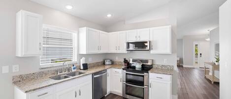 Fridge, microwave, dishwasher, coffee/tea maker