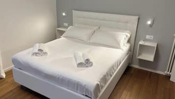 2 slaapkamers, een strijkplank/strijkijzer, internet, beddengoed