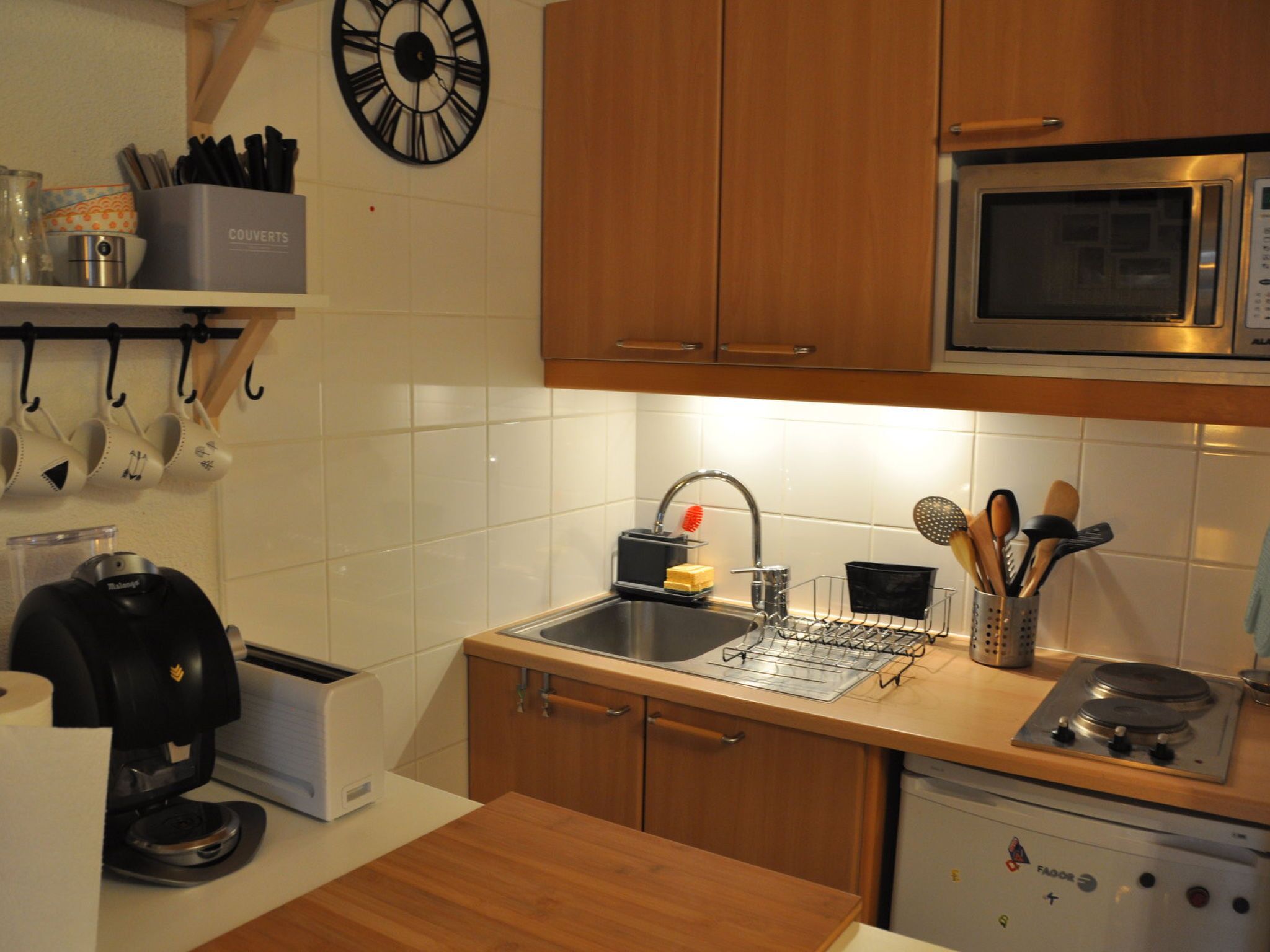 Fridge, microwave, cookware/dishes/utensils