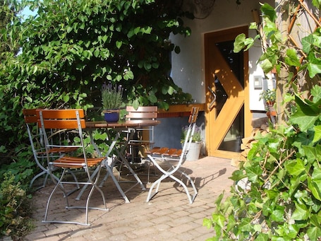 Outdoor dining. Apartment 'Blackforest' with Shared Terrace, Shared Garden and Wi-Fi