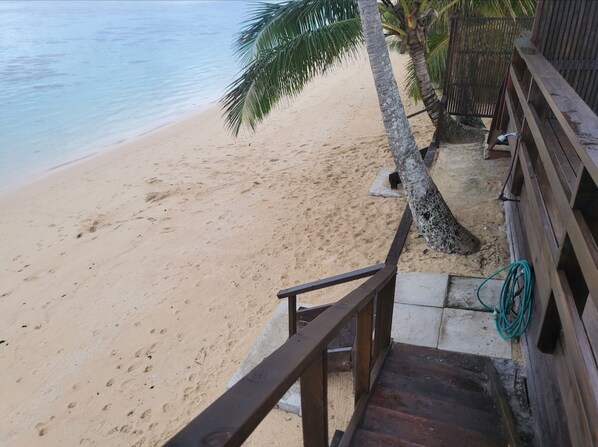 Beach - Tarani Beach Bungalow. Rarotonga. On a white sandy beach front and blue lagoon. (Rarotonga)