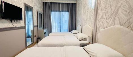 1 室のベッドルーム、デスク、ベッドシーツ