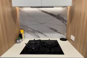 Fridge, microwave, oven, stovetop - Two-bedroom apartment in Canberra City (Dickson)