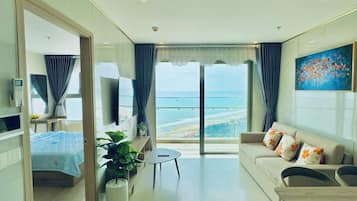 Appartement Luxe, 3 chambres, balcon, vue océan | Coin séjour