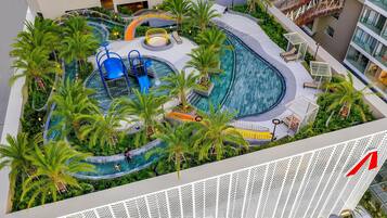 2 outdoor pools, open 6:00 AM to 9:00 PM, pool umbrellas, pool loungers