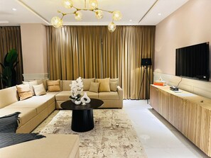 Signature Apartment | Living area | Smart TV, printers - The Opus Luxury Residences (Lahore)