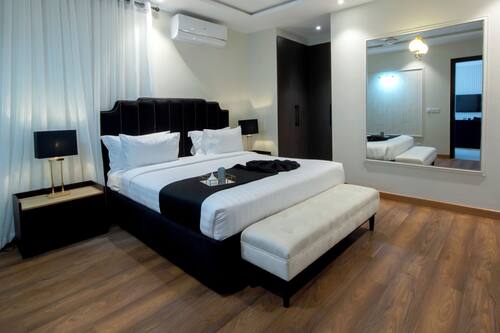 Signature Apartment | Individually decorated, laptop workspace, blackout curtains
