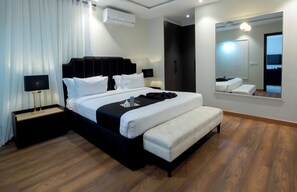 Signature Apartment | Individually decorated, laptop workspace, blackout drapes, soundproofing - The Opus Luxury Residences (Lahore)