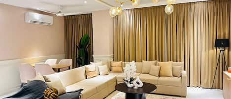 Signature Apartment | Living area | Smart TV, printers