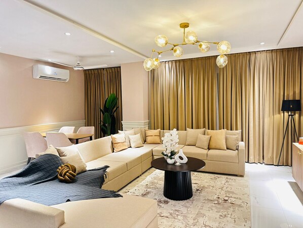 Signature Apartment | Living area | Smart TV, printers - The Opus Luxury Residences (Lahore)