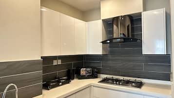 Design Apartment | Private kitchen | Fridge, microwave