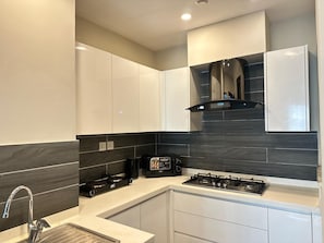 Design Apartment | Private kitchen | Fridge, microwave