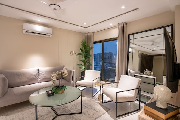 Luxury Apartment | Living area | Smart TV, printers