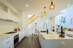 Fridge, microwave, oven, stovetop - Cotton Tree Beach House - Stylish Family Abode (Maroochydore)