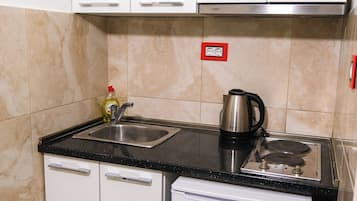 Chambre Triple | Cuisine privée
