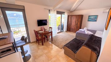 Quarto triplo luxo | Área de estar