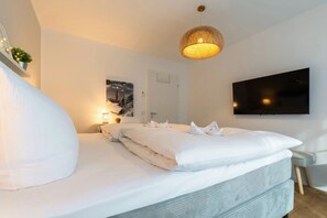 2 slaapkamers, een strijkplank/strijkijzer, gratis wifi