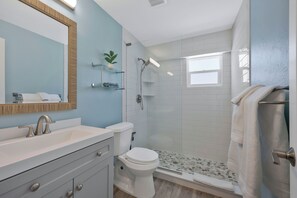 Shower, hair dryer, towels