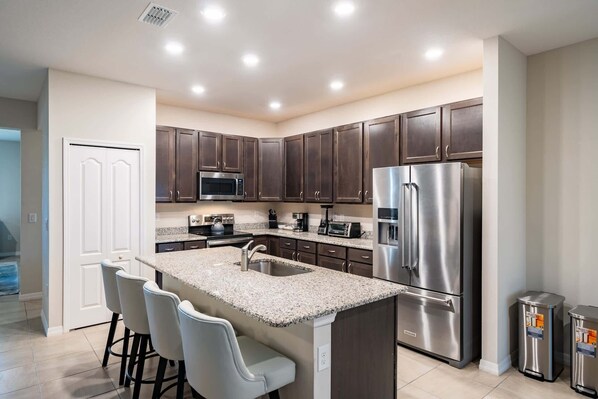 Fridge, microwave, oven, stovetop - Heated Pool 4BR Retreat, Family Friendly (Port St. Lucie)