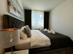 1 habitación, tabla de planchar con plancha, wifi gratis y ropa de cama 