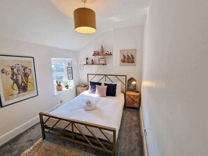 1 bedroom, desk, iron/ironing board, travel cot