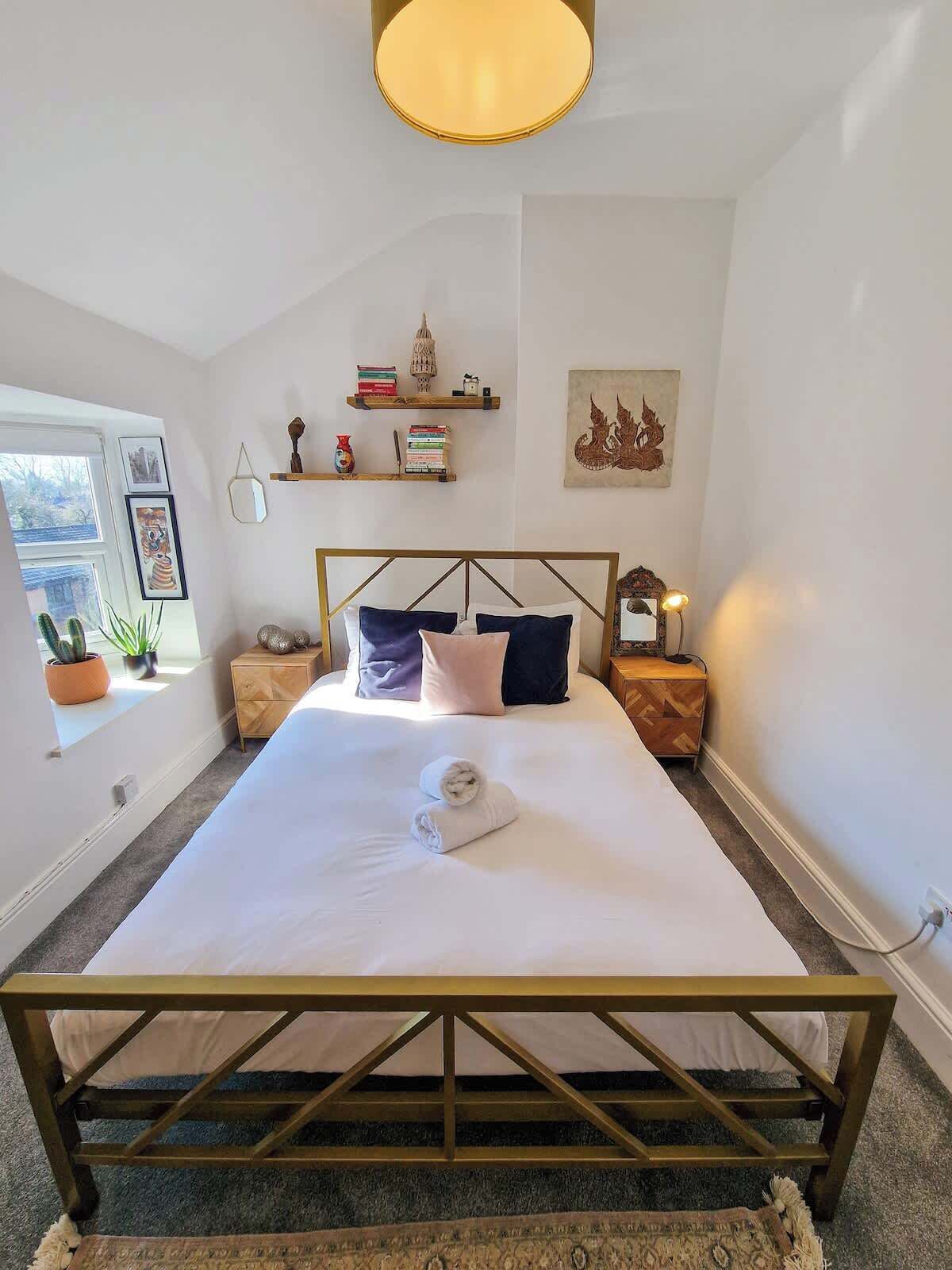 1 bedroom, desk, iron/ironing board, travel crib