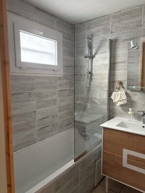 Shower, hair dryer, towels, soap