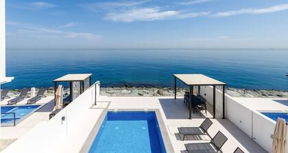 4BR Villa with Arabian Gulf, Mountain, Community Views and Heated Pool