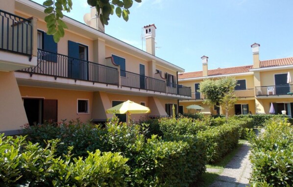 Apartment, 2 Bedrooms, Balcony, Garden View | Exterior - Townhouse With Garden and Pool in Bibione (San Michele al Tagliamento)