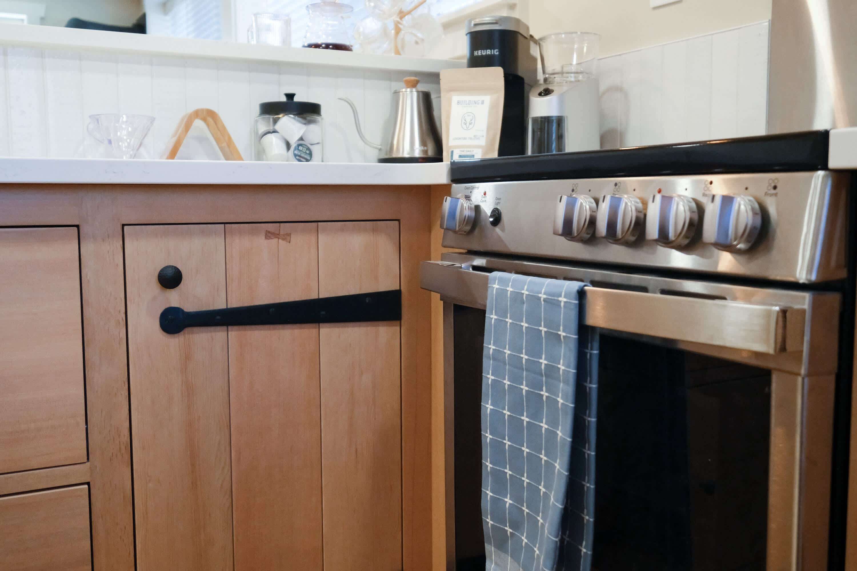 Fully stocked kitchen with custom craftsman cabinets.