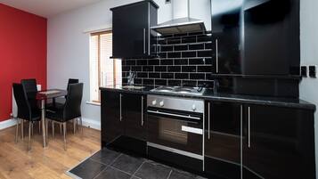 Apartment | Private kitchen | Fridge, microwave, oven, stovetop