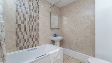 Apartment | Bathroom | Combined shower/tub, deep soaking tub, hair dryer, towels