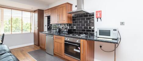 Apartment | Private kitchen | Fridge, microwave, oven, stovetop