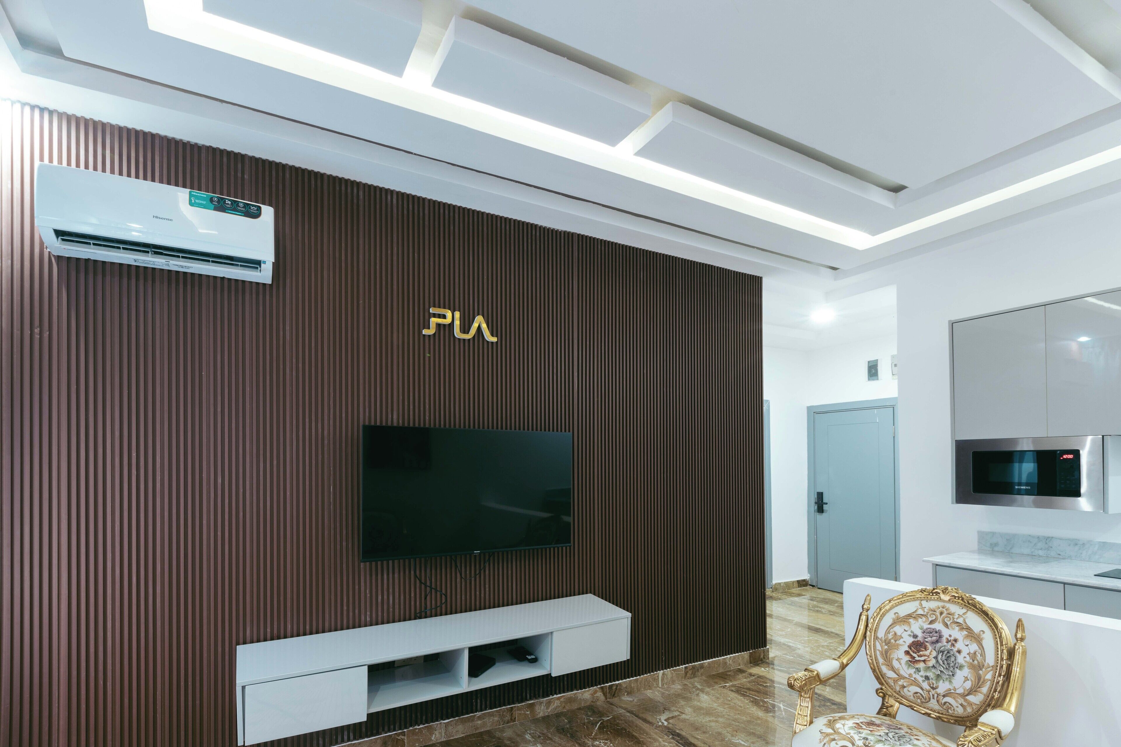 Luxury Apartment, Courtyard View | Living area | Fireplace