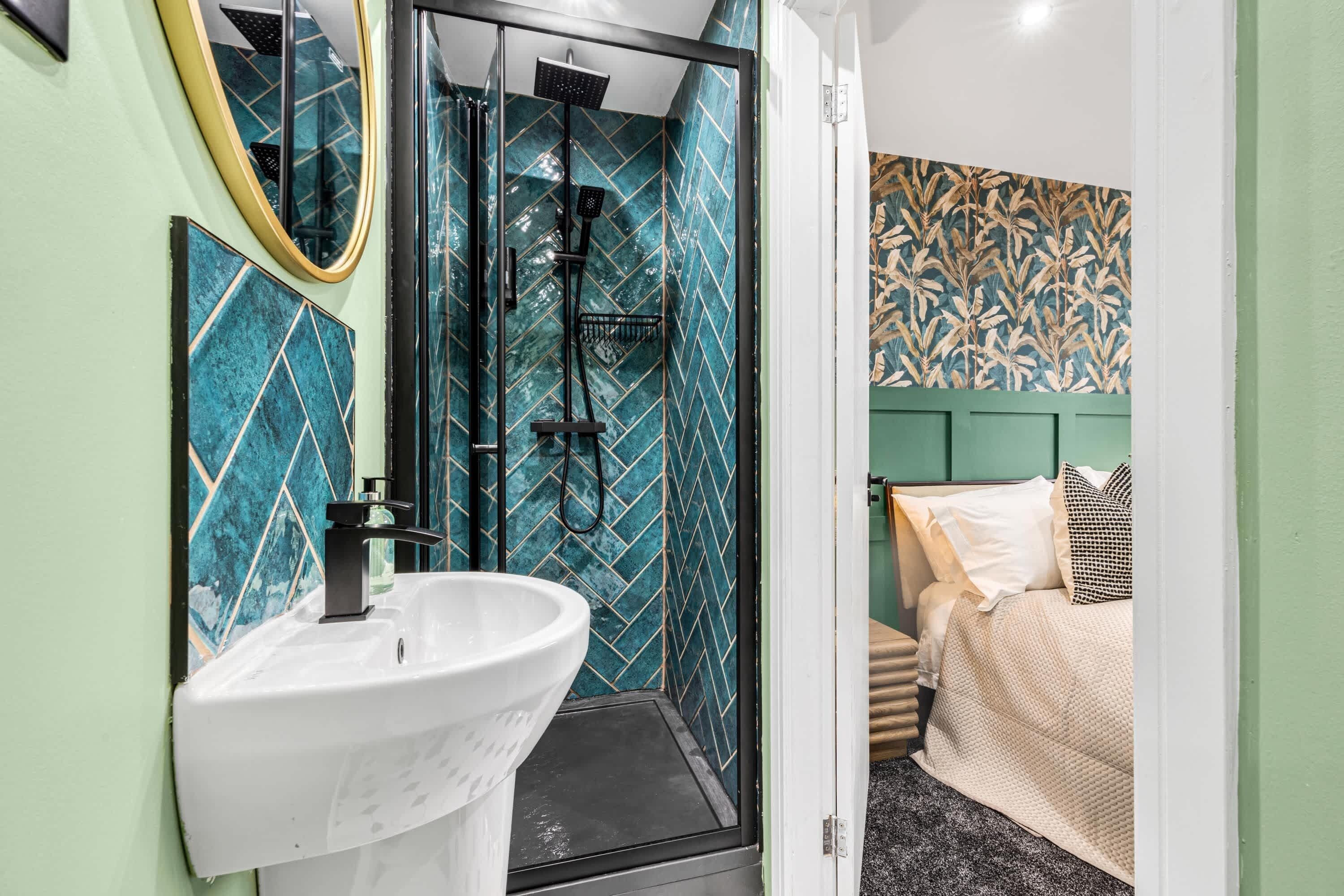 Shower, hair dryer, towels, shampoo
